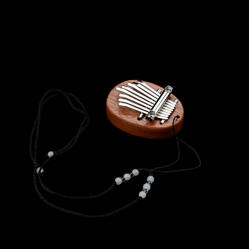 Kalimba a 8 tasti con cordino, - Musical Instrument Family recensione e prezzo